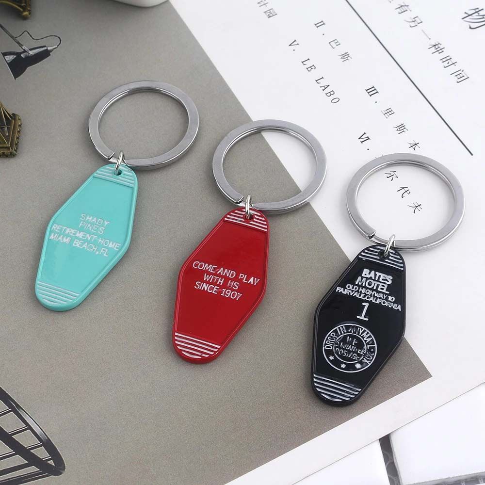 Móc khóa logo GIOVANNI Twin Peaks The Great Northern khách sạn màu xanh lá tráng men 315