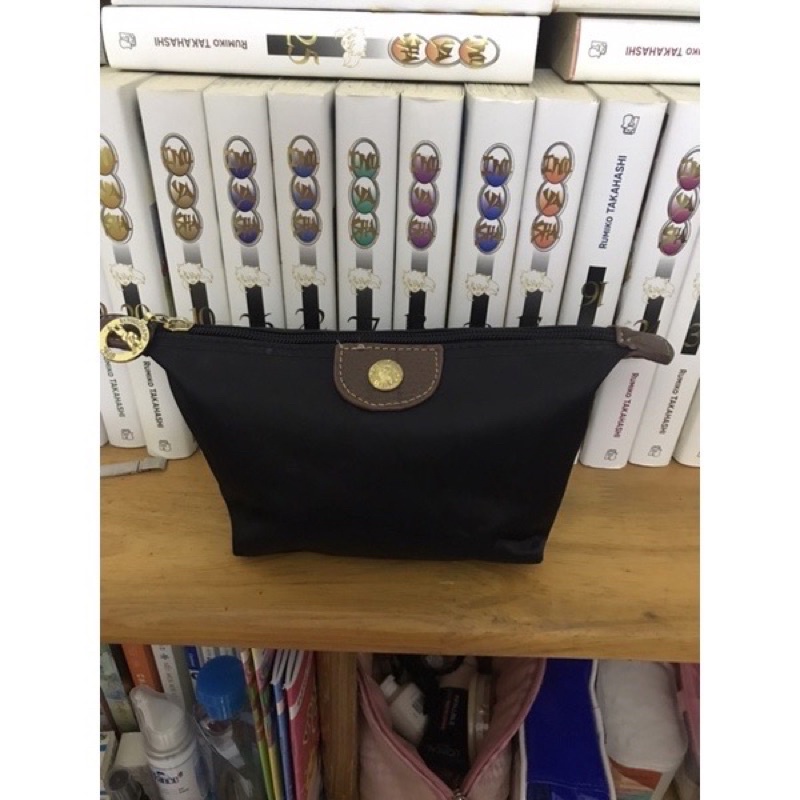 Túi đựng mỹ phẩm mini hiệu Longchamp đáng iu lắm ạ