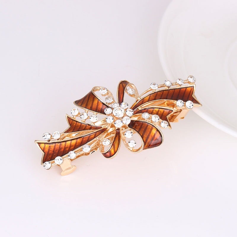 Kẹp đuôi tóc đính đá siêu bền đẹp cho nữ