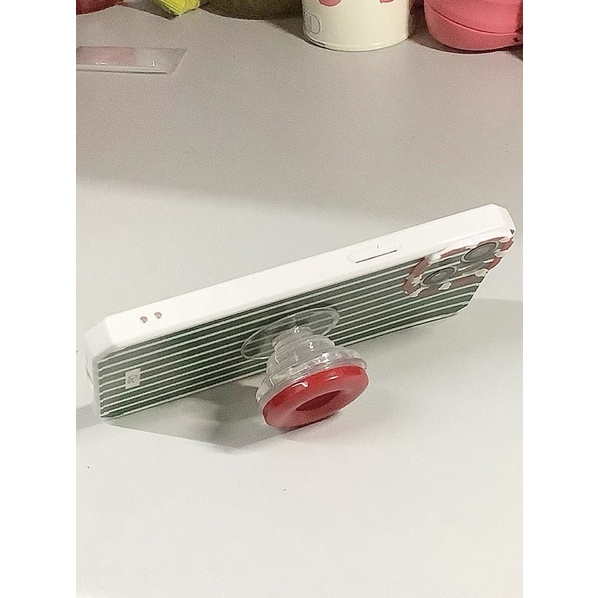 Ốp lưng noen mix cây thông, kẹo gậy và chiếc nút của Tiệm tạp hoá gần nha