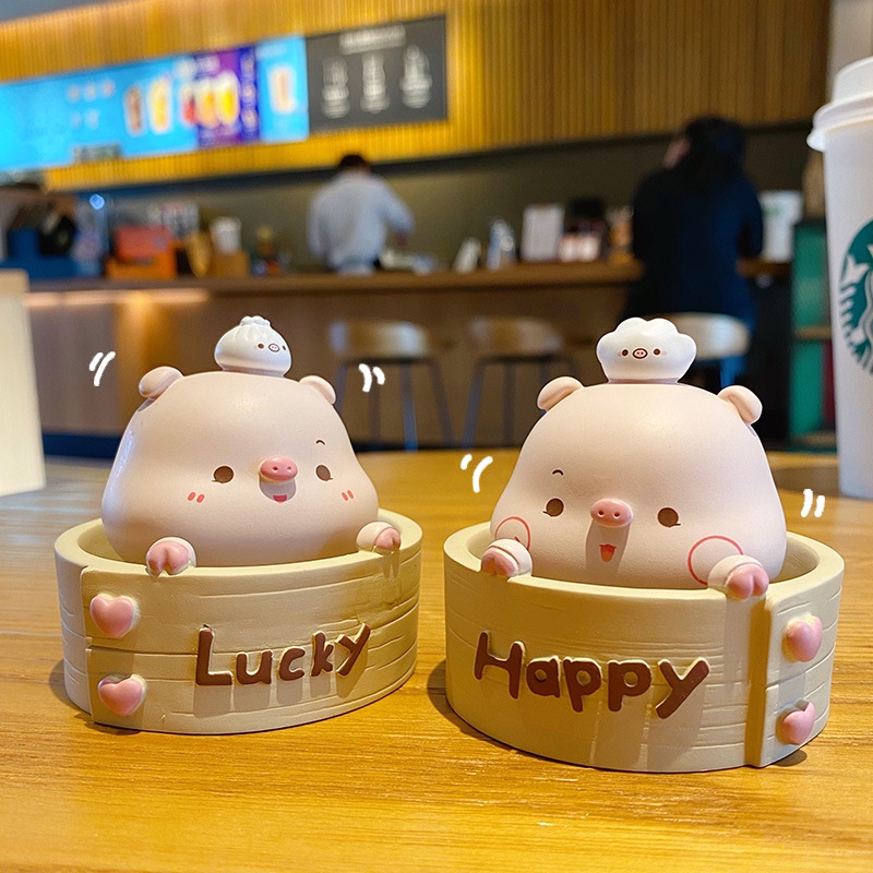 Mô hình heo hồng lắc đầu gật gù trong hũ Happy và Lucky biểu cảm dễ thương trang trí taplo ô tô, bàn làm việc, quà tặng