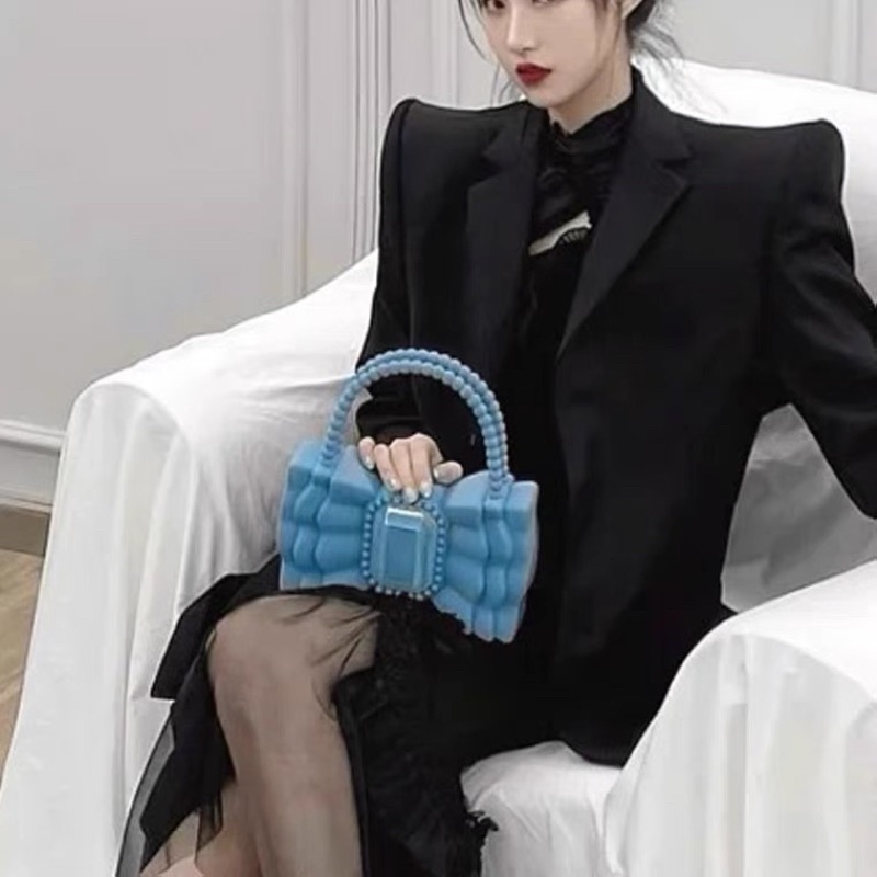 Túi xách nữ hình nơ sáng chảnh lạ mắt