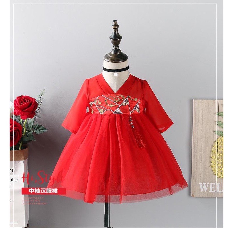 váy gấm đỏ bé gái