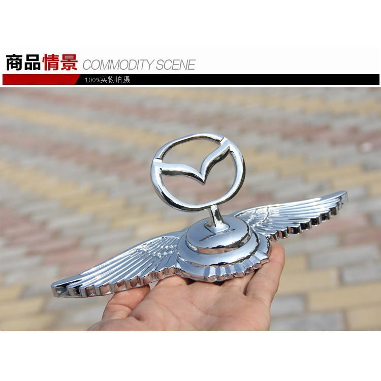 Biểu tượng logo Mazda cánh chim đặt nắp capo CAO