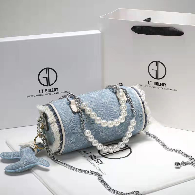 Túi Đeo Chéo Hình Trụ Chất Liệu Canvas Phối Dây Xích Thời Trang Mùa Hè Mới Cho Nữ