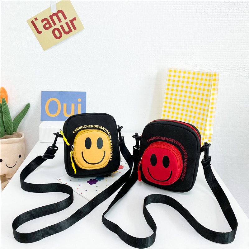 Túi Đeo Chéo Vai Hình Tròn Nhỏ Vải Canvas Họa Tiết Mặt Cười Hoạt Hình Dễ Thương Cho Trẻ Em