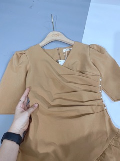 Váy nhúm eo cúc ngọc