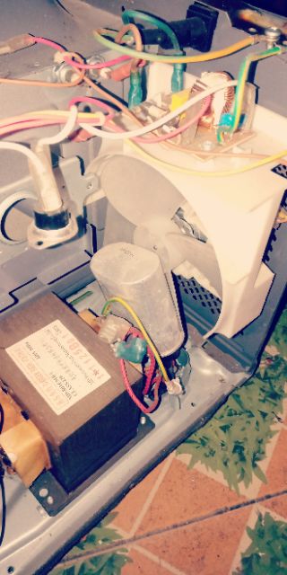 Quạt  và tụ Lò vi sóng tháo máy mới 80%