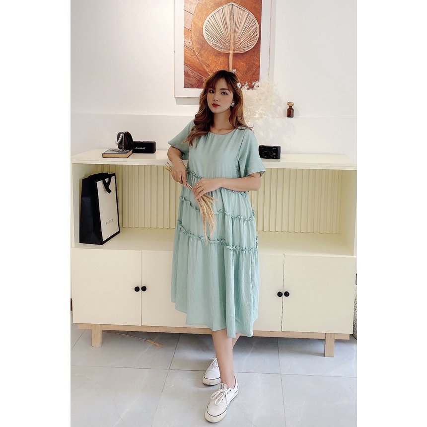 Đầm bầu nhún tầng xinh xăn