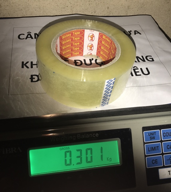 0,3kg/1 cuộn băng dính trắng hoặc vàng trong