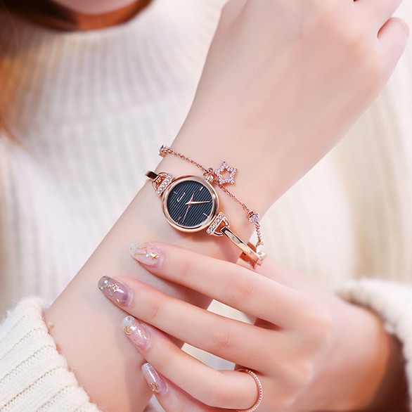 Đồng hồ lắc tay nữ Kimio 6400 dây rút mặt tròn kim loại đính kèm ngôi sao cực xinh