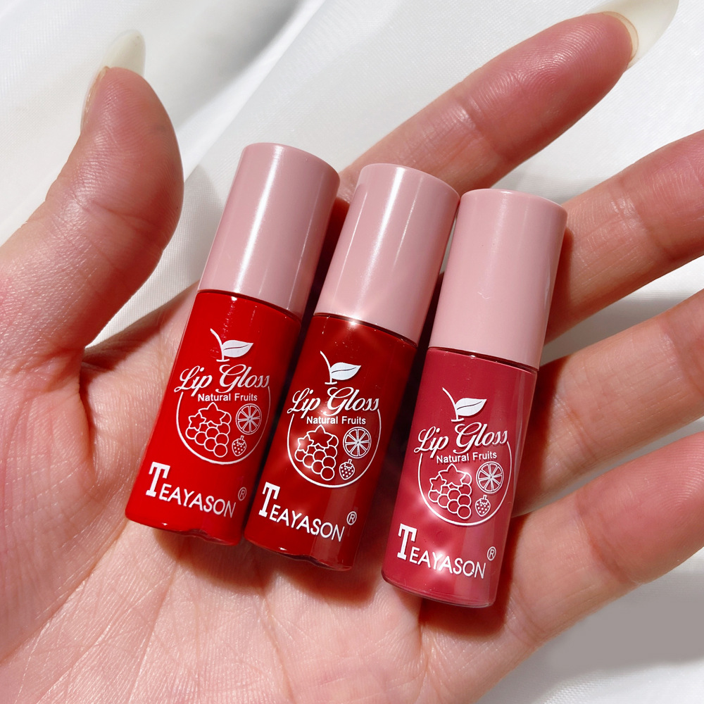 Dầu khoáng Vitamin E Professional Shiny Cherry Moisturizing Plumping Clear Lip Gloss Volume Tint