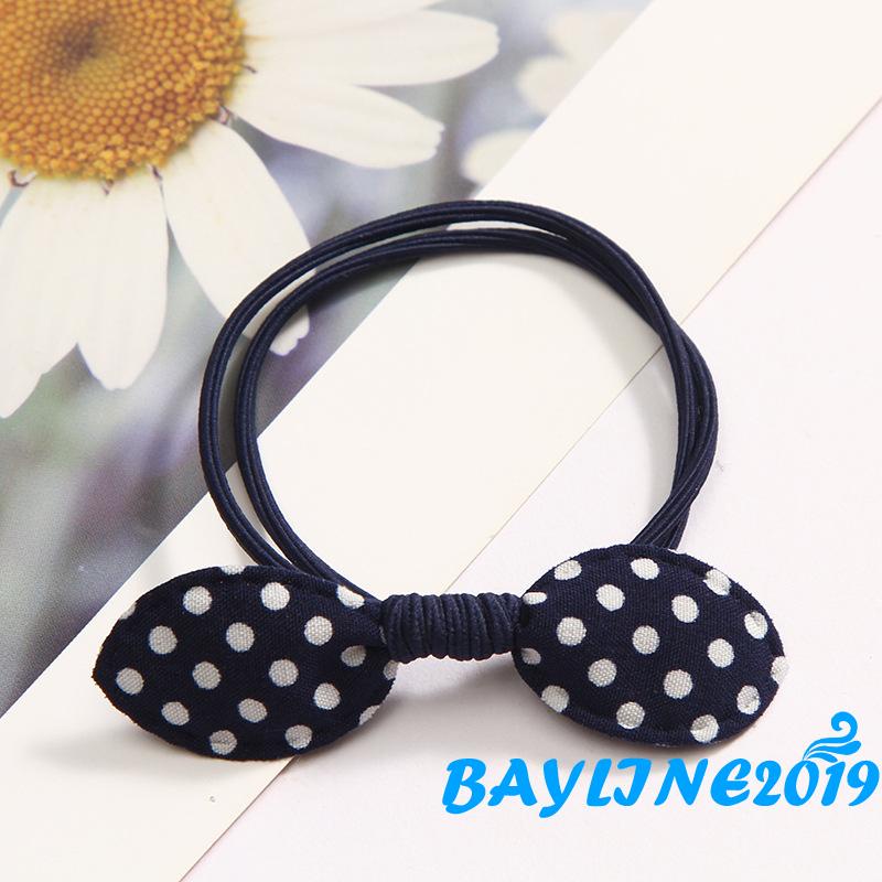 Dây buộc tóc đính nơ họa tiết chấm bi dễ thương cho bé gái