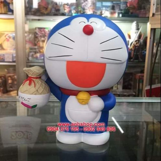 Mô hình Mèo ú Doraemon cầm túi bánh thuần chủng Doremon