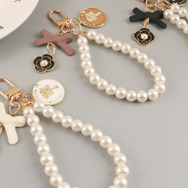 Móc khóa trang trí túi xách/điện thoại hình bông hoa và nơ phối chuỗi hạt ngọc trai nhân tạo tinh tế