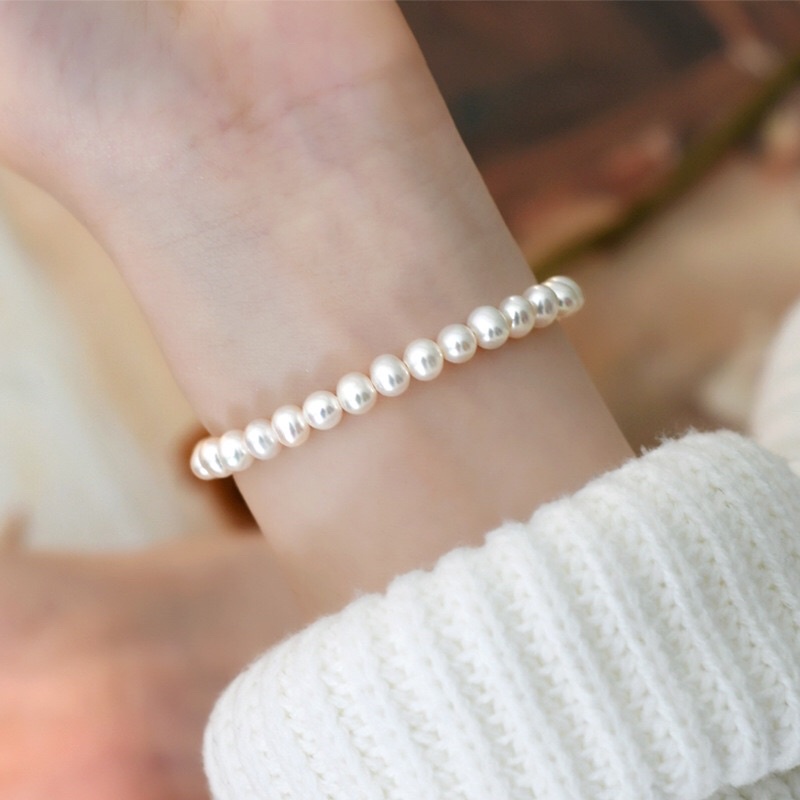 Vòng tay ngọc trai nhân tạo 6ly mix đá xanh