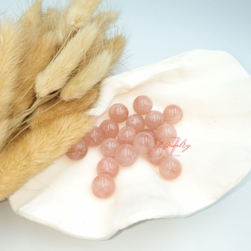 1 hạt đá màu hồng