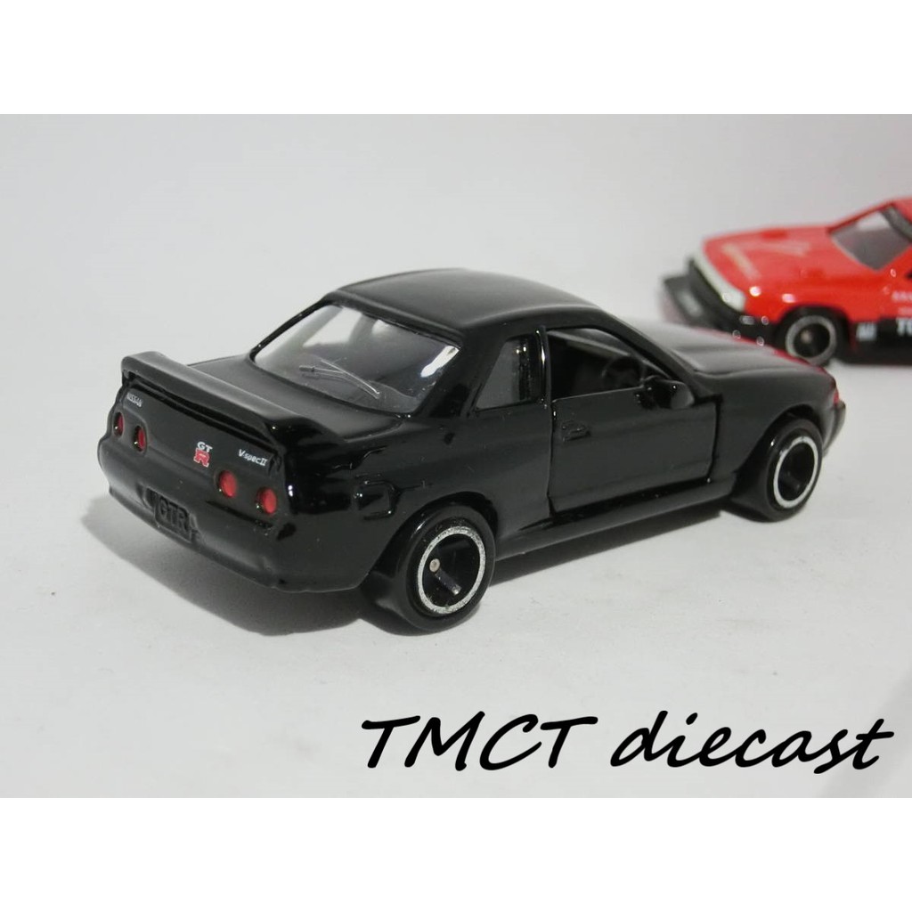 Mô hình 1/64 Tomica Nissan Skyline GT-R No.20 1999 (có gương - đèn nhựa) - Skyline Silhouette Formula Made in China