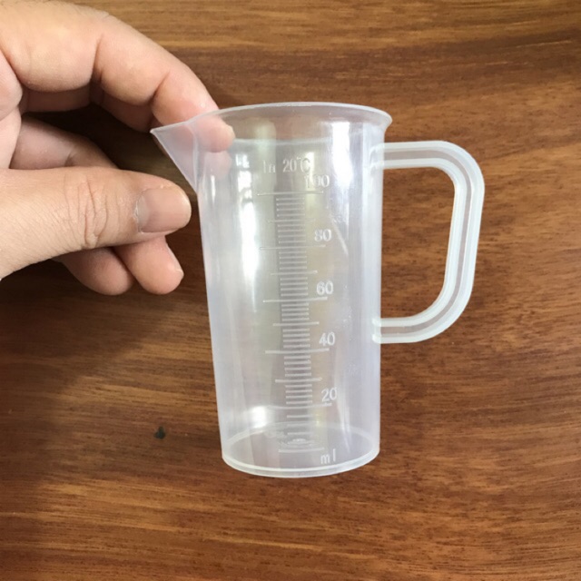 Ca nhựa định lượng 100ml dùng để đong nước chế cà phê phin | BigBuy360 - bigbuy360.vn