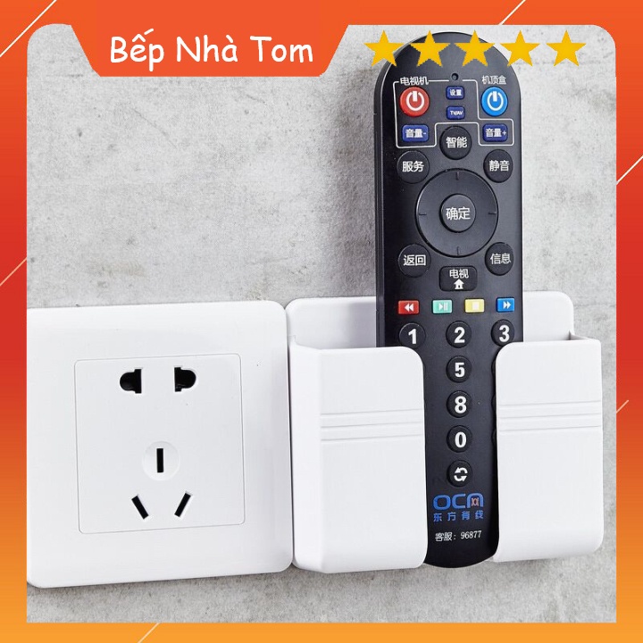 Kệ Đựng Remote Để Điện Thoại Dán Tường Có Khe Luồn Dây Sạc Tiện Lợi