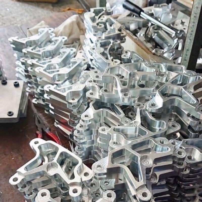 pass nhôm bass cnc heo thắng 2 piston đối xứng