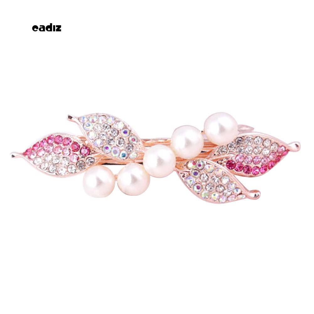 Kẹp tóc nơ đính hạt giả ngọc trai