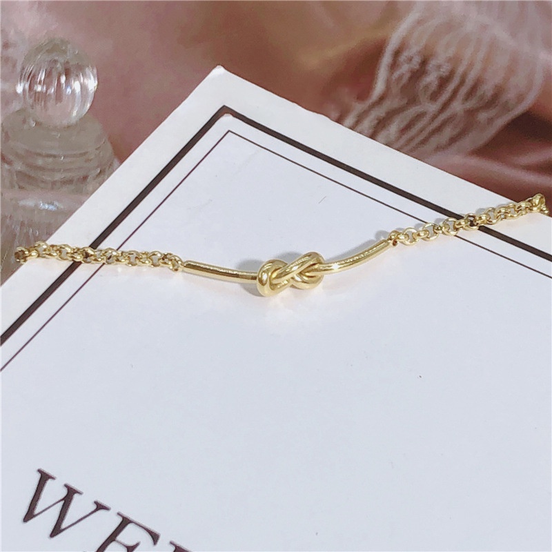 Vòng đeo tay thép titan mạ vàng 18k thắt nút thời trang dành cho nữ