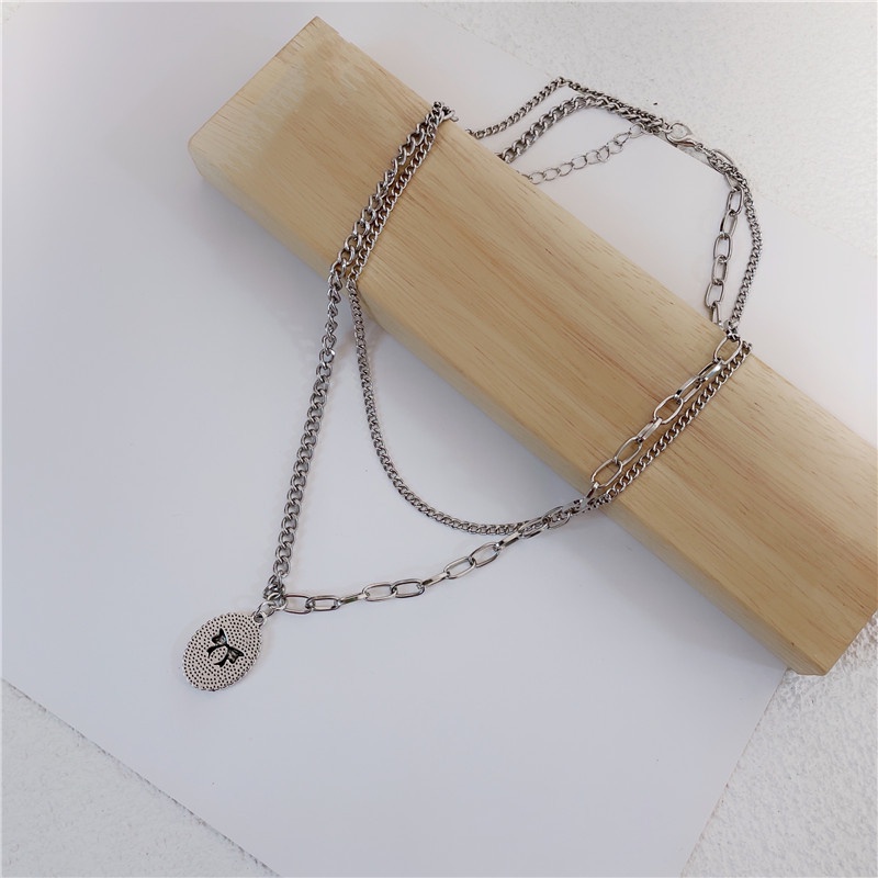 Vòng cổ Dạng Chuỗi Kép Mặt Hình Nơ Màu Bạc Phong Cách Punk Hiphop Thời Trang