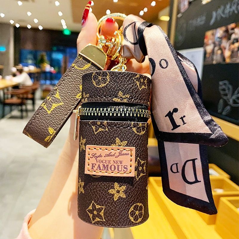 Móc khóa túi trống L.V khóa kéo đựng đồ đẹp sang trọng