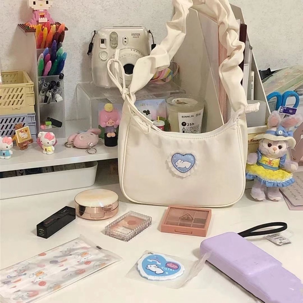 Túi đeo vai dây rút họa tiết thỏ dễ thương thời trang sành điệu cho nữ