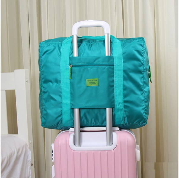Túi du lịch xách tay gấp gọn chống thấm nước có thể dùng trên vali kéo