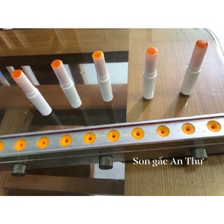 son dưỡng môi gấc