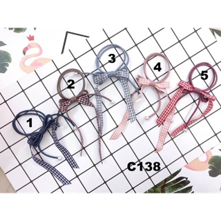 Cột tóc sọc caro xinh xắn