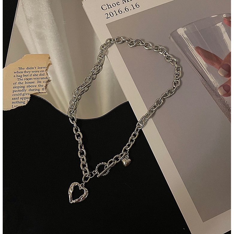 Vòng cổ Bằng Thép Titan Mặt Trái Tim Rỗng Màu Bạc Thời Trang Cho Nữ