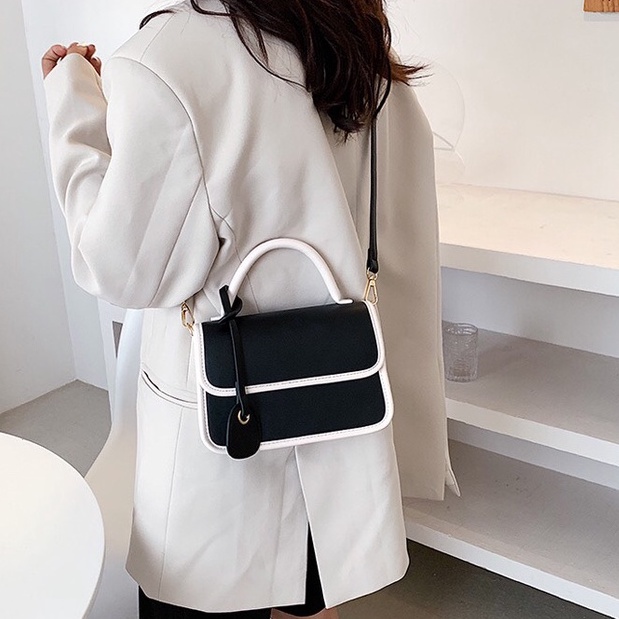 Túi xách nữ cầm tay, da trơn phối viền nổi bật hàng mới 2022 SL37