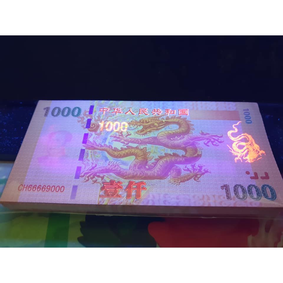 TIỀN LƯU NIỆM HÌNH RỒNG PHONG THỦY CỦA TRUNG QUỐC