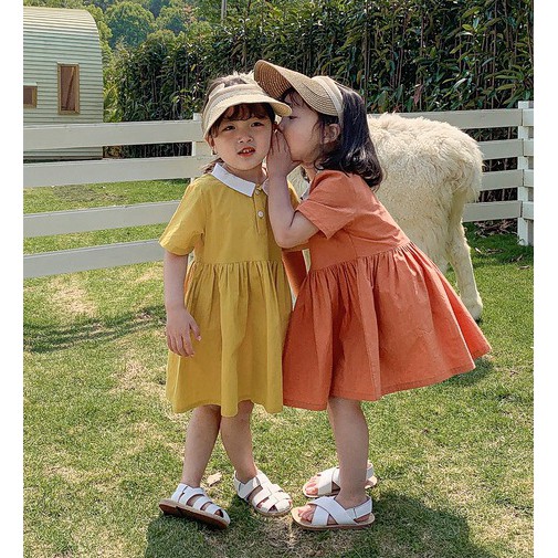 Váy bé gái có cổ màu cam