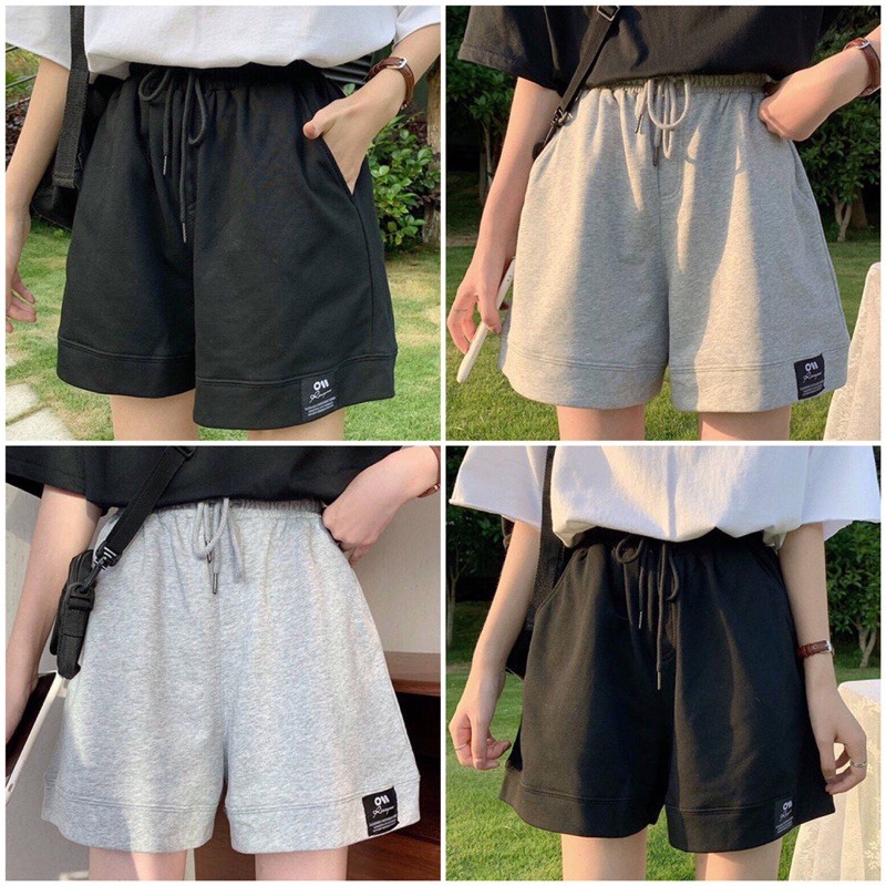 Quần đùi vải logo thể thao mềm mịn