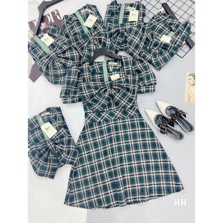 váy xoè xanh nơ ngực