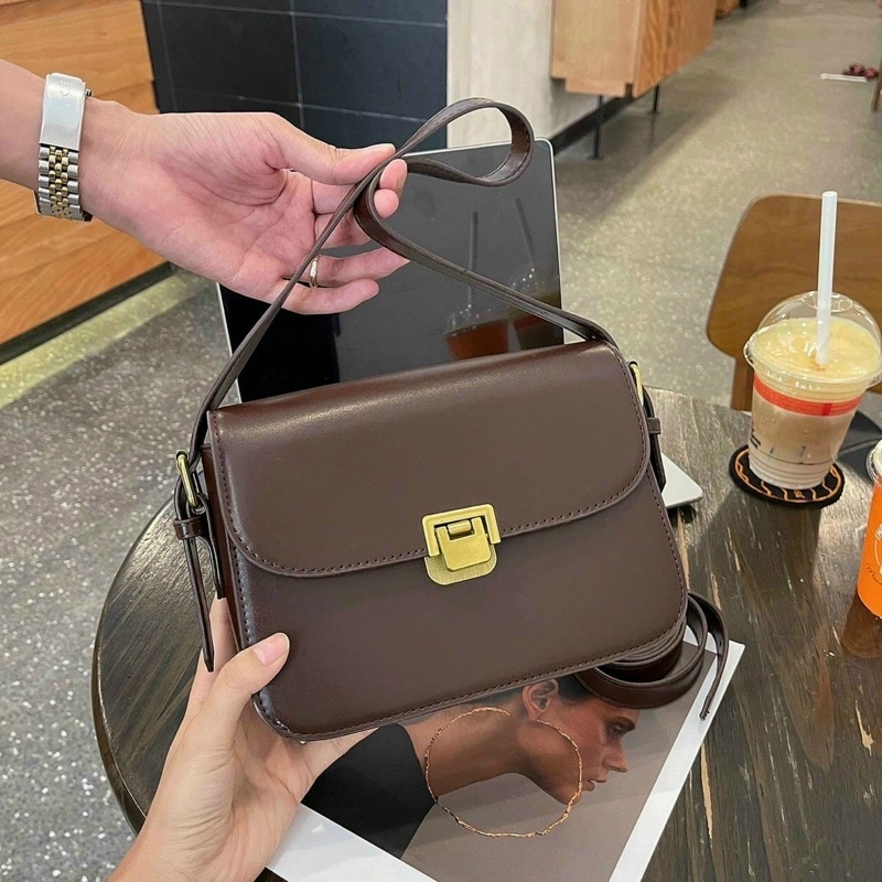 Túi đeo chéo quỳnh búp bê dây xích. hàng nội đại trung chuẩn xịn