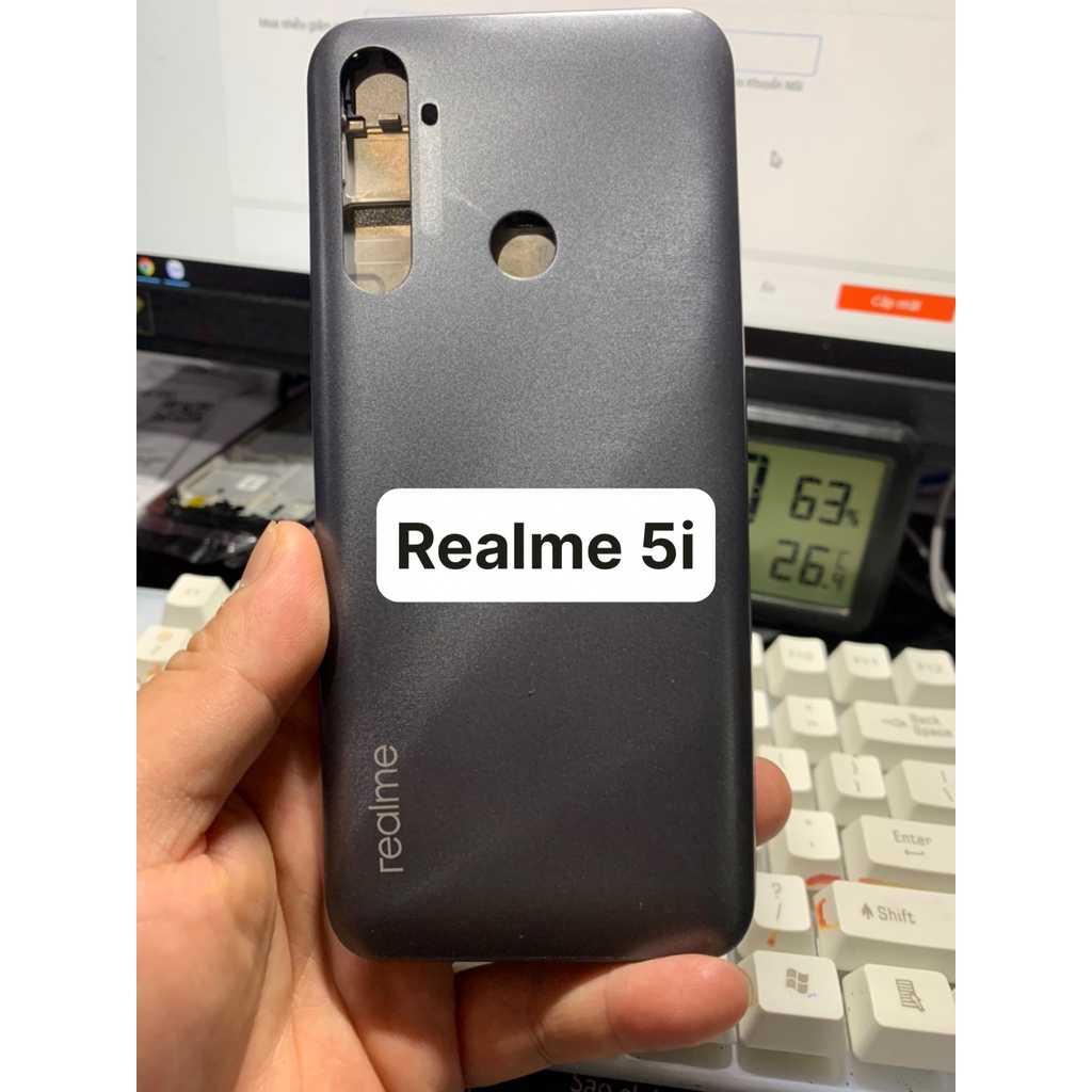 Bộ vỏ điện thoại zin hãng oppo realme 5i gồm xương, lưng, phím bấm và kính camera.