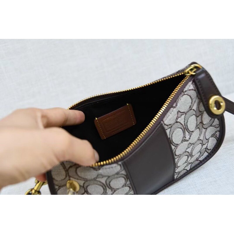 Túi Coach thuyền vãi