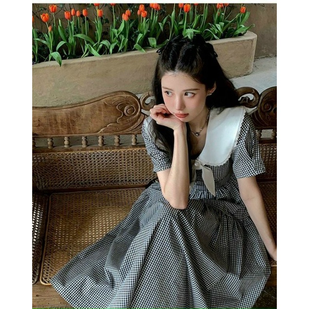 Đầm caro cổ sen