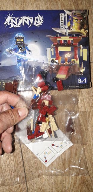 Lắp ráp 1 hộp LegoNinja rồng QD653 có nhiều chi tiết