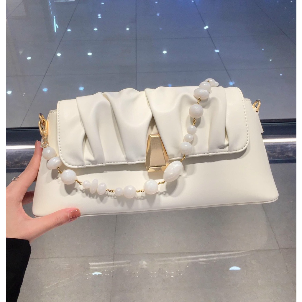 túi đeo vai size 26-31cm x 15cm x9cm màu trắng