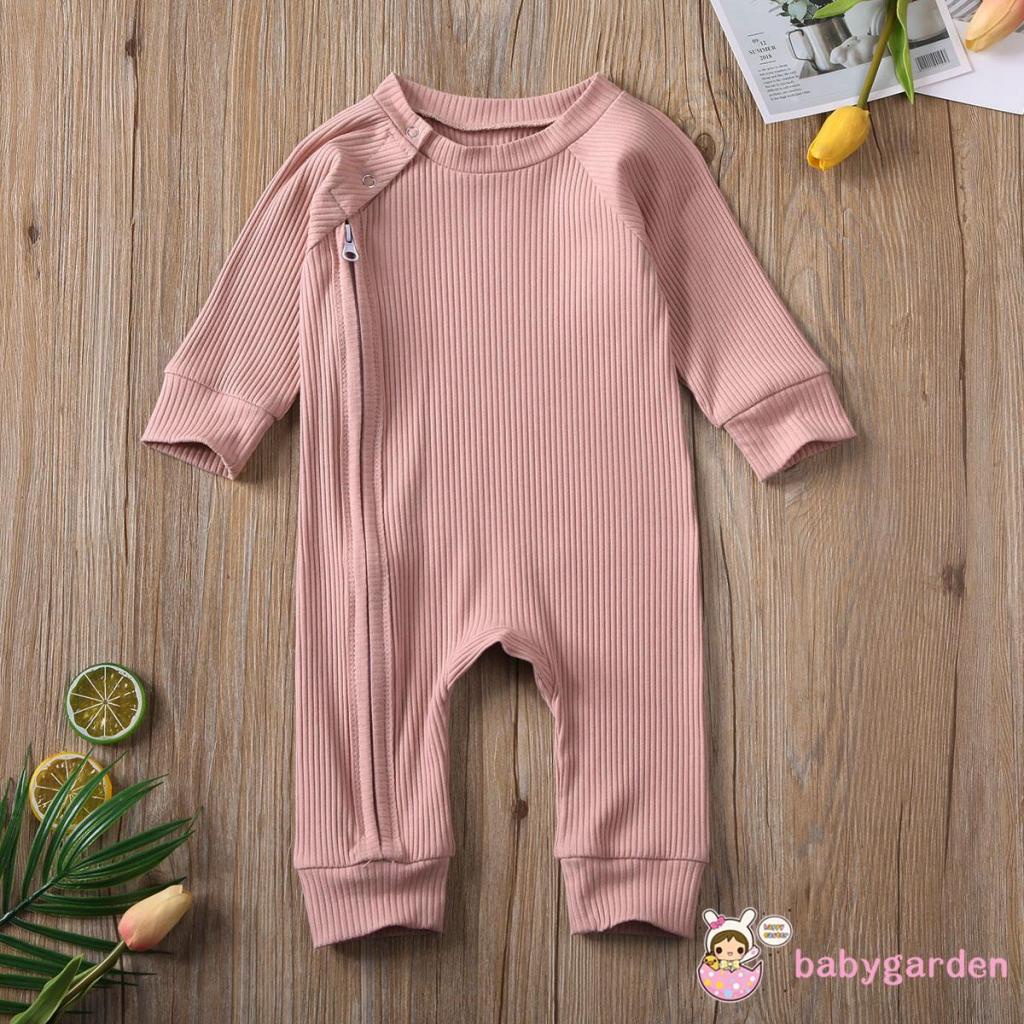 Bộ áo liền quần cổ tròn tay dài màu trơn cài nút phối khóa kéo thời trang cho bé