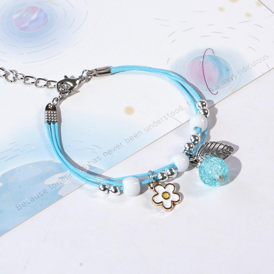 Vòng tay gốm gắn HOA TRỨNG TRẮNG lục lạc lắc tay nam nữ xinh xắn