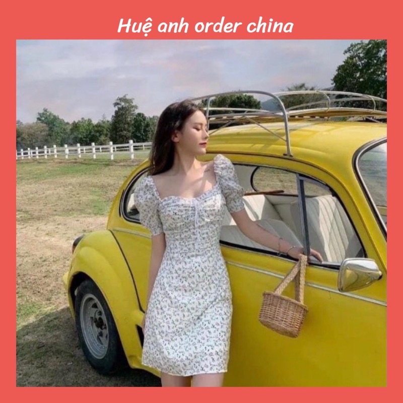 Váy trắng hoa nhí tay bồng điệu đà