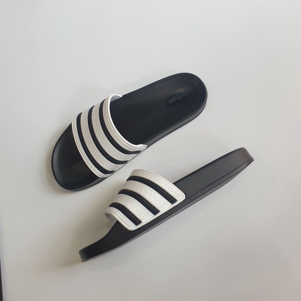 Dép nam nữ quai ngang slipper Pathon quai PVC và đế PU đen quai sọc đen trắng SD38