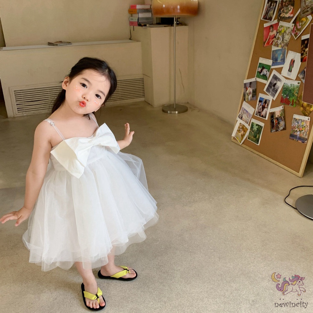 Đầm công chúa hai dây đính nơ kiểu Hàn Quốc xinh xắn dành cho bé gái